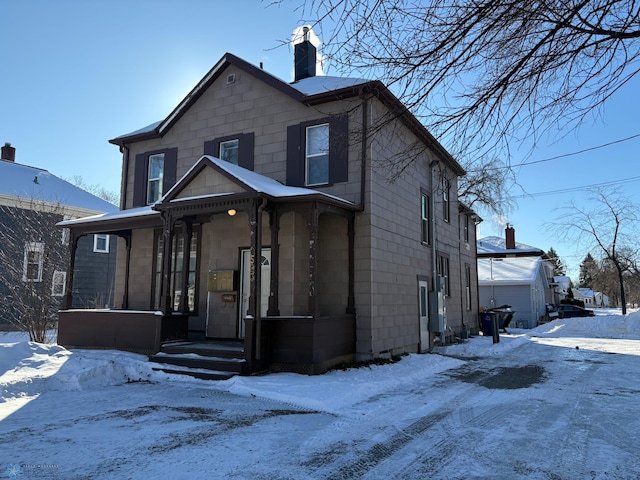 view of front of property with a chimney