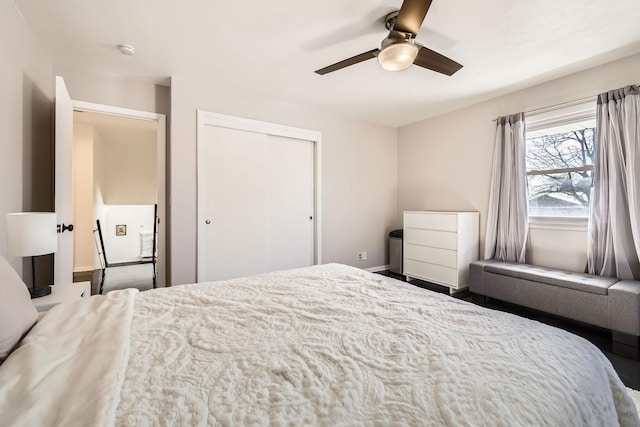 bedroom featuring a ceiling fan and a closet