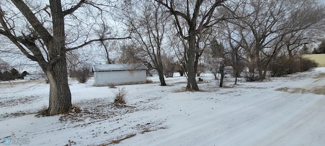 view of yard covered in snow