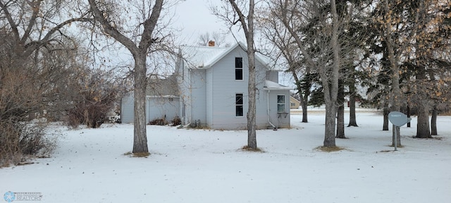 exterior space with a chimney