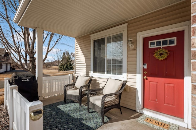 entrance to property with covered porch