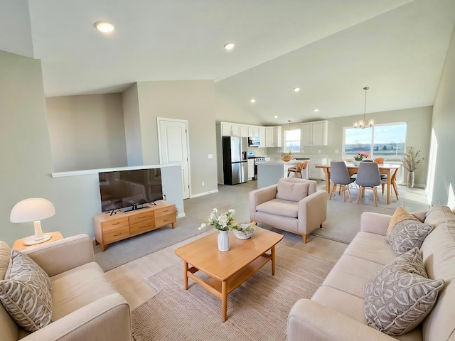 living room with a chandelier, recessed lighting, vaulted ceiling, and light wood-style flooring