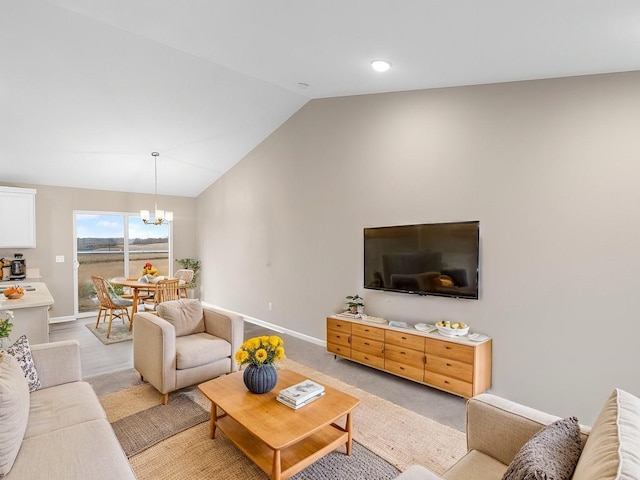 living area with light carpet, baseboards, a chandelier, and vaulted ceiling