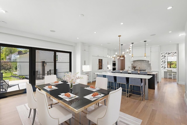 4889 Lake Harriet Pkwy, Minneapolis, MN 55419 - dining area featuring healthy amount of natural light, light wood-type flooring, and recessed lighting