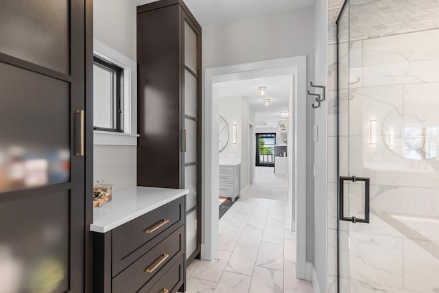 4889 Lake Harriet Pkwy, Minneapolis, MN 55419 - bathroom with marble finish flooring, a marble finish shower, and vanity