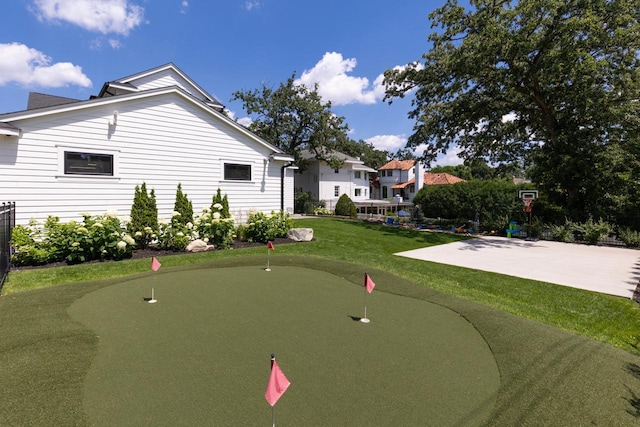 4889 Lake Harriet Pkwy, Minneapolis, MN 55419 - view of property's community featuring a putting area, a lawn, and a patio