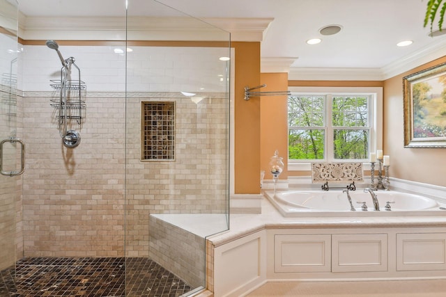 bathroom featuring a bath, recessed lighting, a shower stall, and ornamental molding