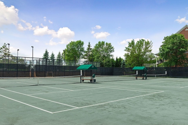 view of sport court with fence