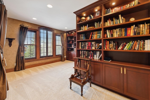 sitting room featuring recessed lighting and light colored carpet