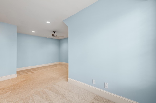 spare room featuring recessed lighting, baseboards, ceiling fan, and carpet flooring