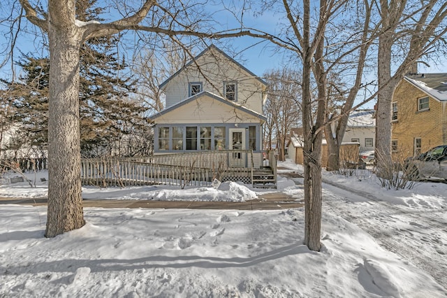 view of front of home with a wooden deck