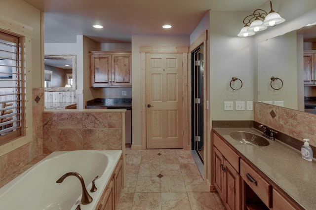 full bath featuring recessed lighting, a closet, vanity, and a bath