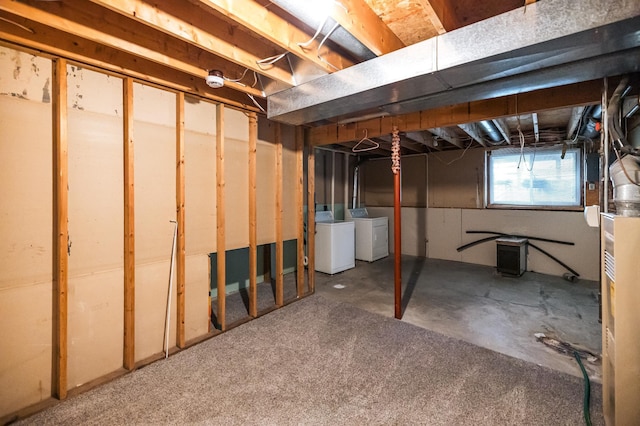 basement featuring washing machine and dryer