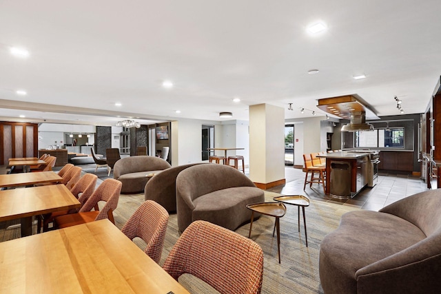 interior space featuring light tile patterned floors and recessed lighting