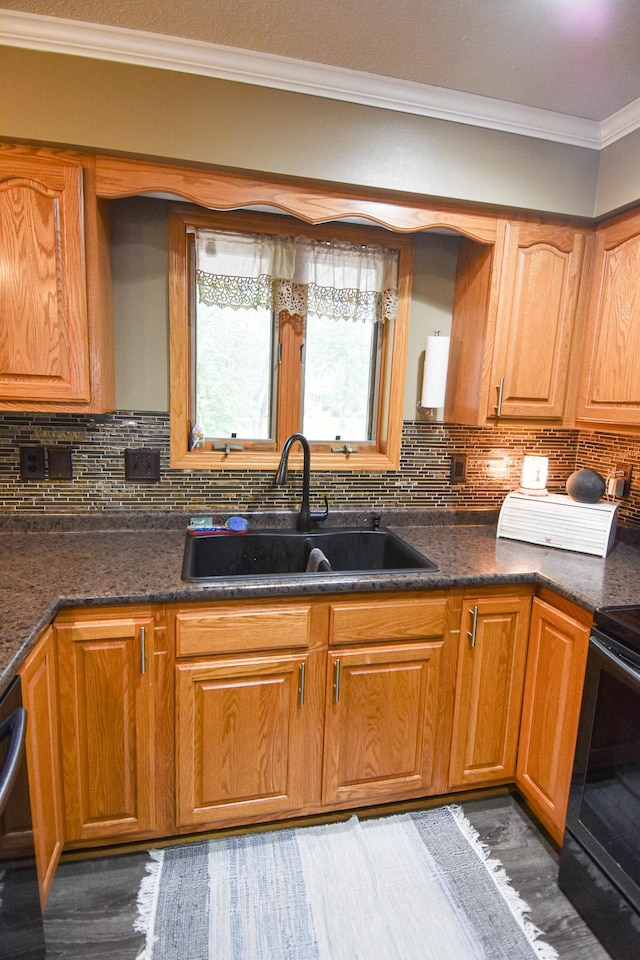 kitchen featuring a sink, electric stove, brown cabinets, tasteful backsplash, and crown molding