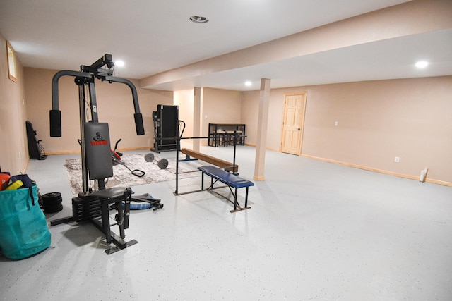 exercise room featuring recessed lighting and baseboards