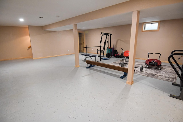 exercise area featuring baseboards