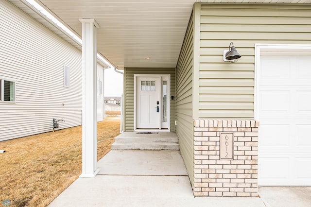 property entrance featuring a garage