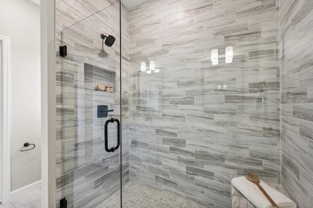 bathroom featuring a stall shower