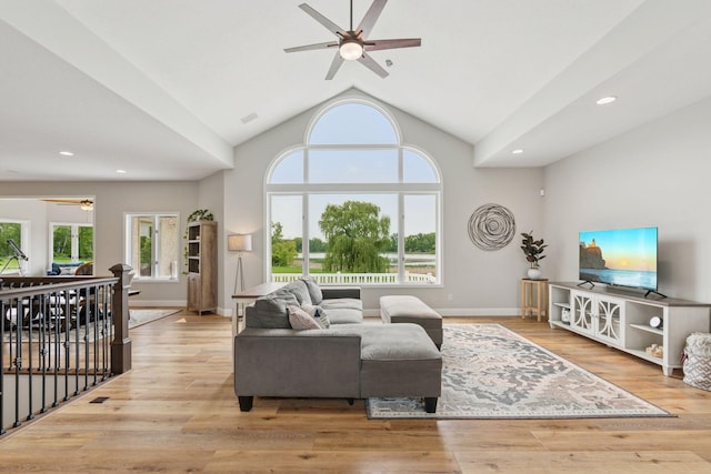 13380 Willandale Rd, Rogers, MN 55374 - living room featuring ceiling fan, lofted ceiling, wood finished floors, recessed lighting, and baseboards