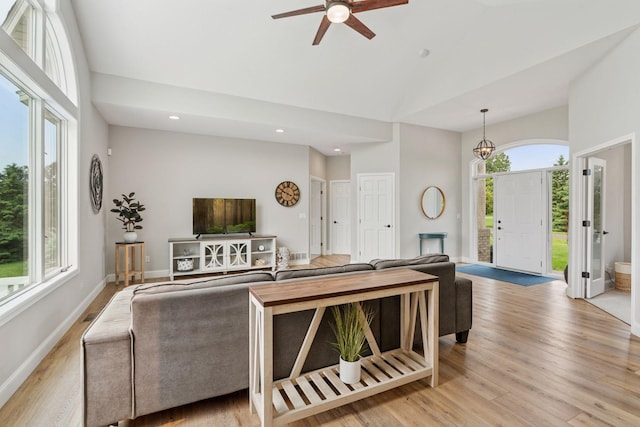 13380 Willandale Rd, Rogers, MN 55374 - living area featuring light wood-style flooring, a ceiling fan, recessed lighting, baseboards, and lofted ceiling