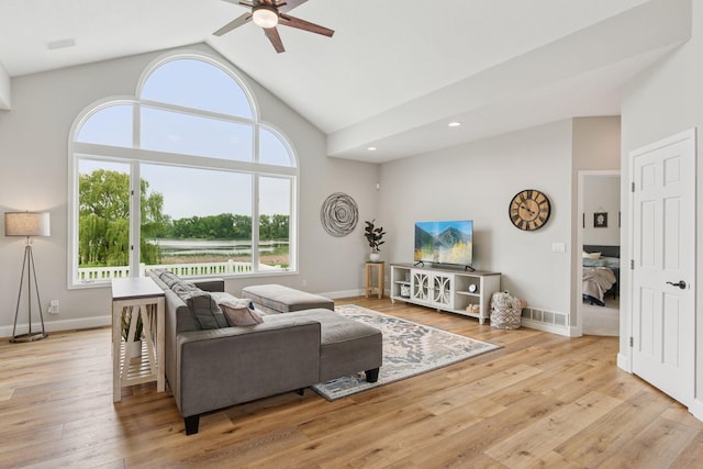 13380 Willandale Rd, Rogers, MN 55374 - living area featuring a ceiling fan, plenty of natural light, light wood-style floors, high vaulted ceiling, and recessed lighting