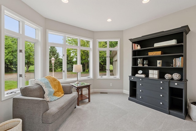 13380 Willandale Rd, Rogers, MN 55374 - sitting room with healthy amount of natural light, baseboards, light carpet, and recessed lighting