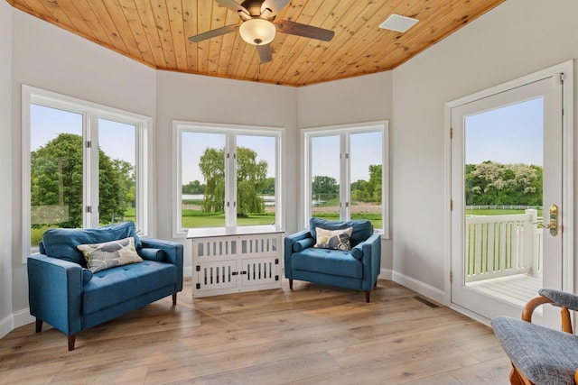 13380 Willandale Rd, Rogers, MN 55374 - sunroom with french doors, wood-type flooring, and baseboards