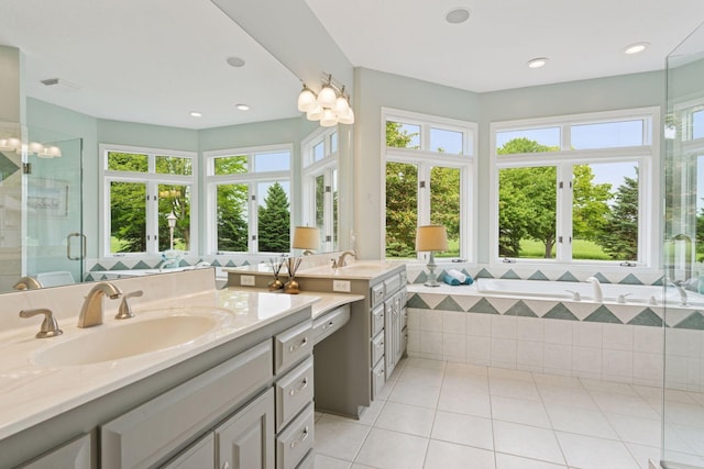 13380 Willandale Rd, Rogers, MN 55374 - full bathroom featuring vanity, tile patterned flooring, plenty of natural light, a shower stall, and recessed lighting