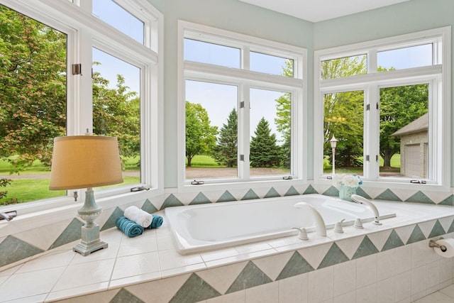 13380 Willandale Rd, Rogers, MN 55374 - full bathroom with a garden tub and healthy amount of natural light