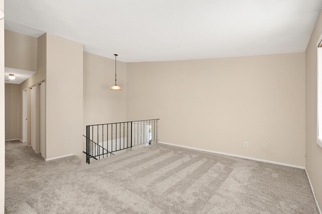 16860 Grenadier Ave, Lakeville, MN 55044 - empty room with carpet floors, high vaulted ceiling, and baseboards