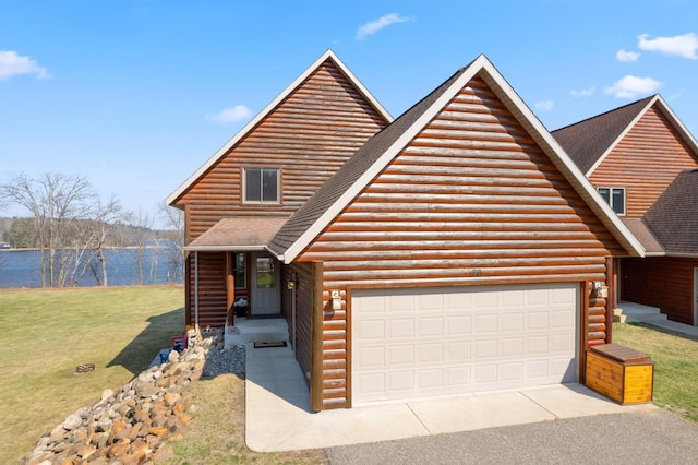 log home with a shingled roof, a water view, a garage, driveway, and a front lawn