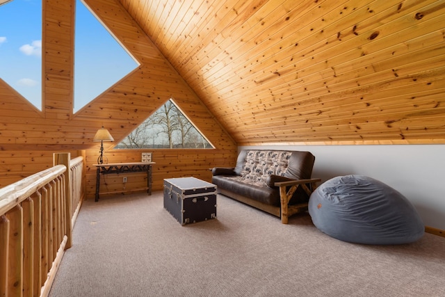 living area featuring vaulted ceiling, wood ceiling, carpet flooring, and wood walls