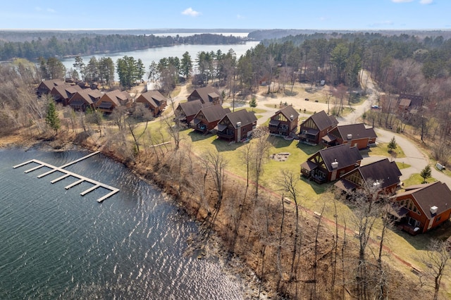 aerial view with a residential view and a water view