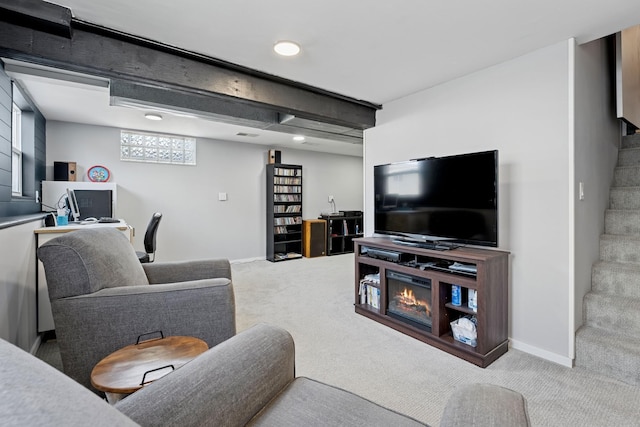 living area featuring beam ceiling, carpet flooring, stairway, and baseboards