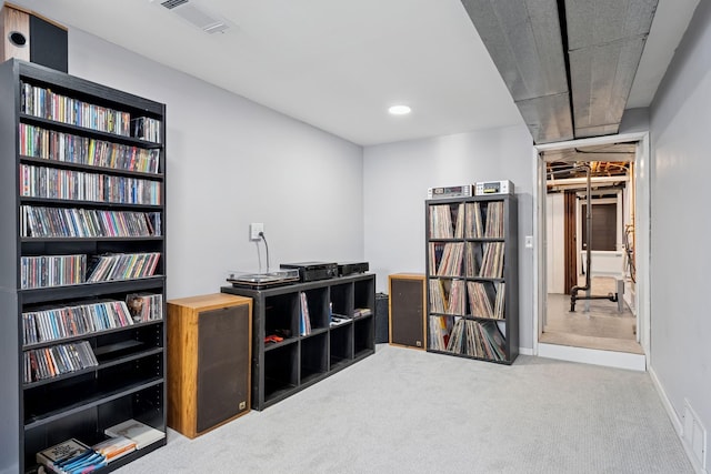 interior space with visible vents, baseboards, and carpet