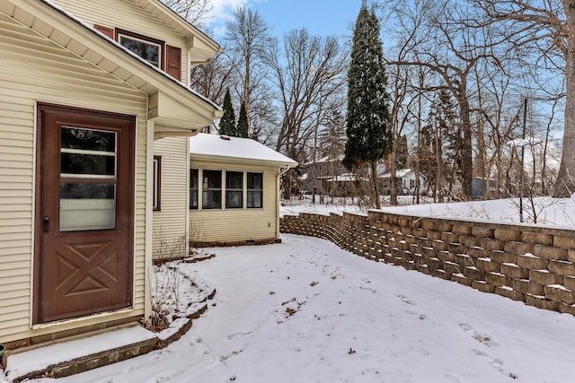 view of yard covered in snow