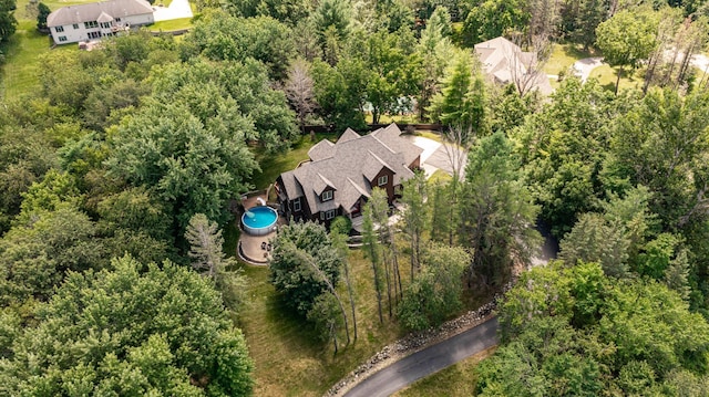 aerial view featuring a view of trees