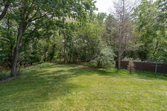 view of yard featuring fence