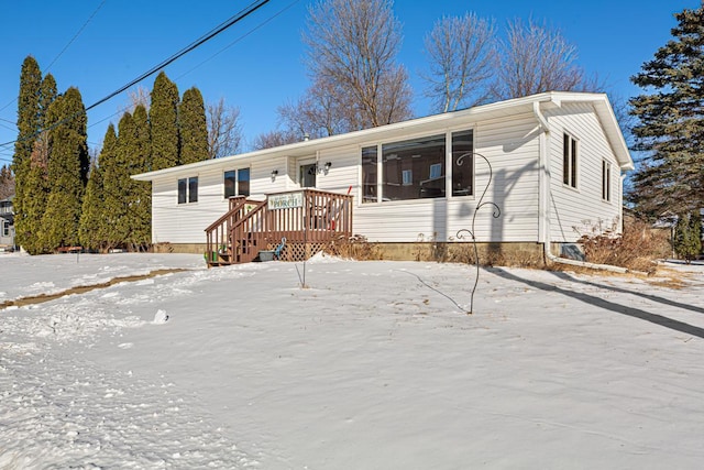 view of front of property featuring a deck