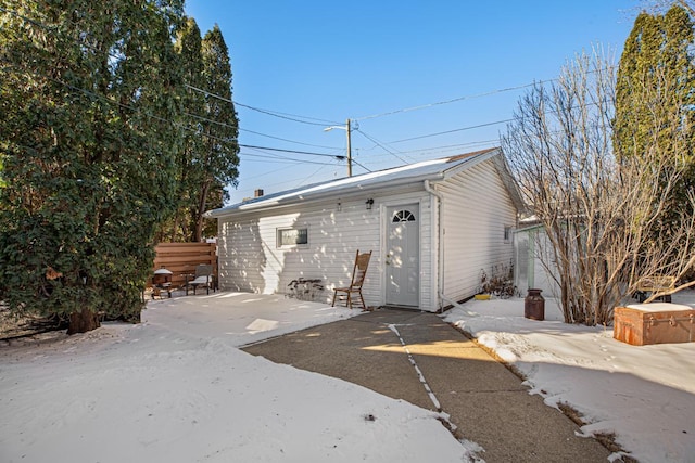 rear view of property featuring a patio