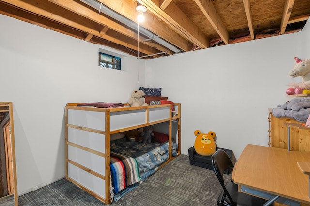 bedroom with dark colored carpet