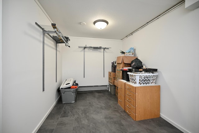 storage room featuring a baseboard radiator