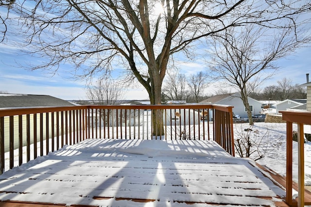 view of snow covered deck