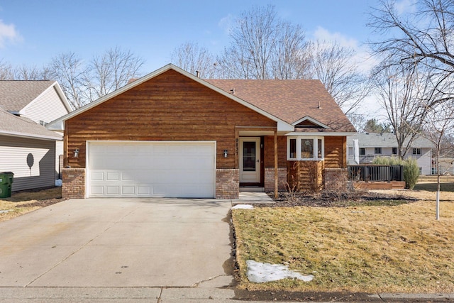 view of front of house with a garage, brick siding, driveway, and a shingled roof