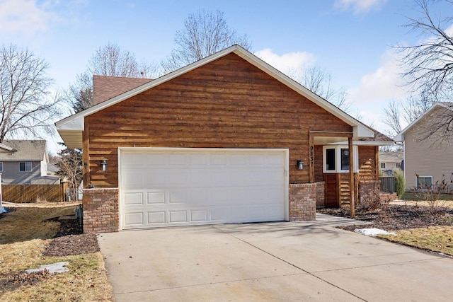 view of front facade featuring brick siding, driveway, and fence