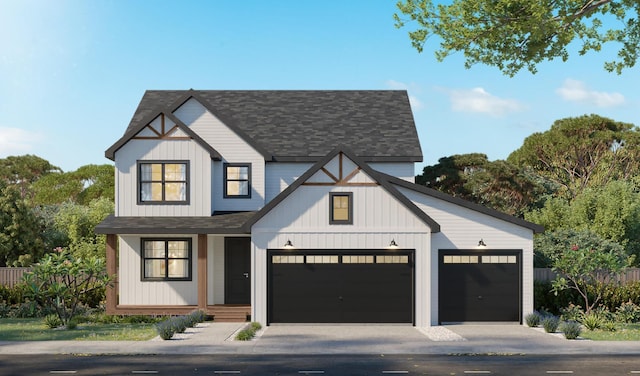 view of front facade featuring concrete driveway, board and batten siding, an attached garage, and roof with shingles