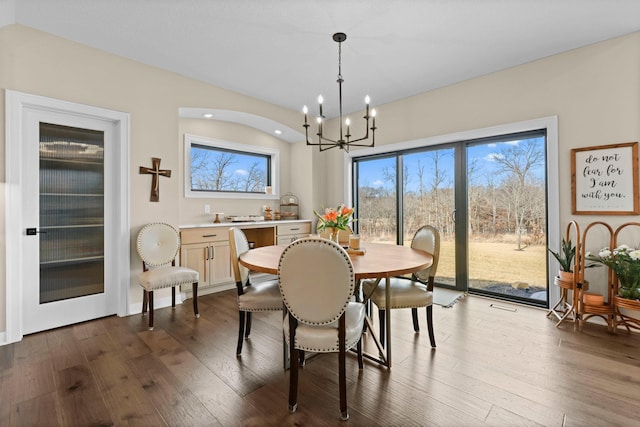 19986 Unity St NW, Oak Grove, MN 55011 - dining space featuring vaulted ceiling, a notable chandelier, recessed lighting, and dark wood-type flooring