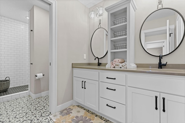 19986 Unity St NW, Oak Grove, MN 55011 - bathroom with a sink, baseboards, a tile shower, and double vanity