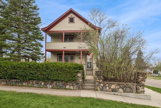1001 Humboldt Ave W, Saint Paul, MN 55118 - victorian-style house with a porch and a balcony